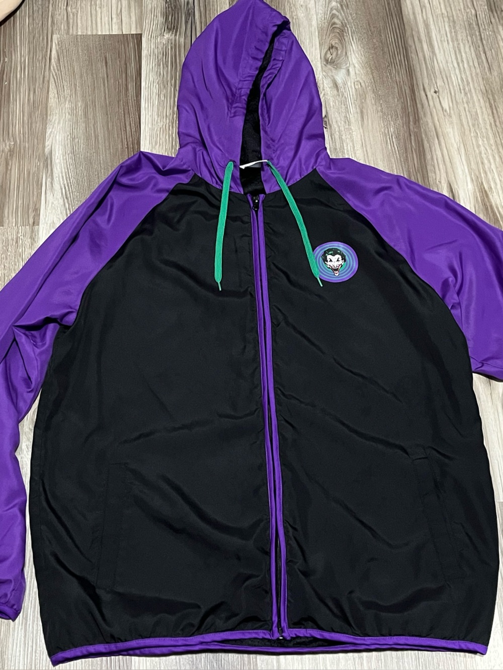 DC Comics Black and Purple Joker Hooded Windbreaker with Green Accents